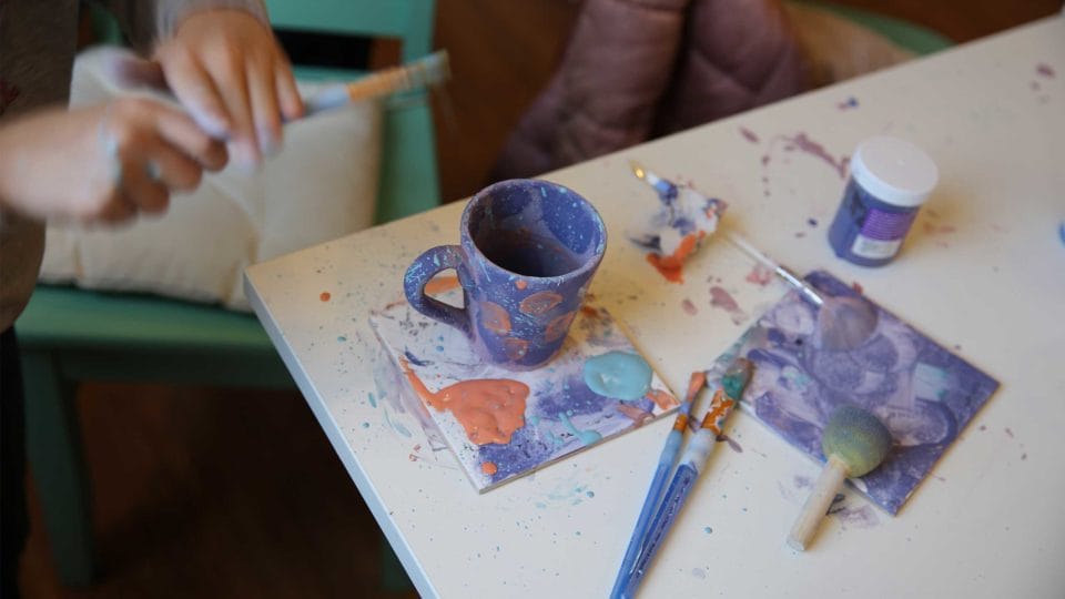 The Ark Ceramics campaign. Picture of a cup being painted. 