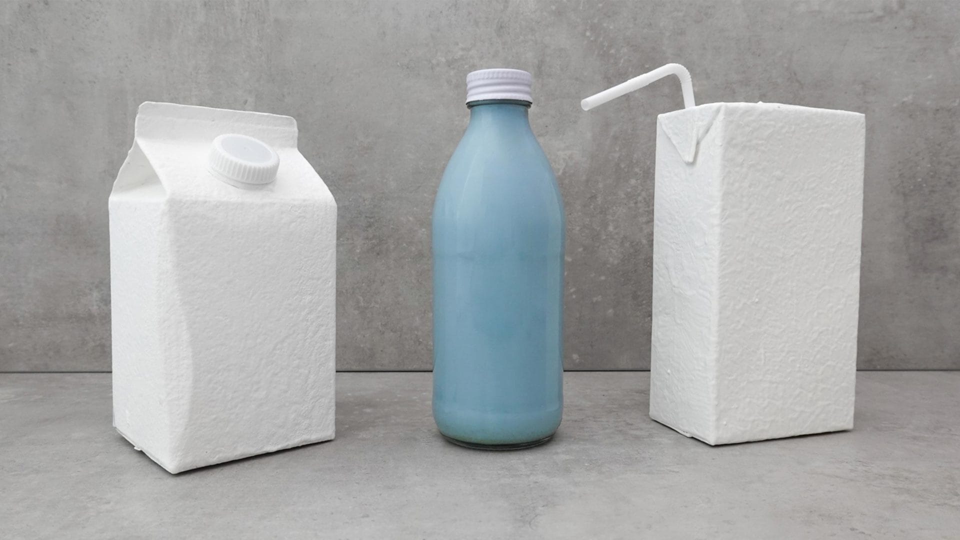 Two classic white PET packaging with a blue glass bottle in the middle