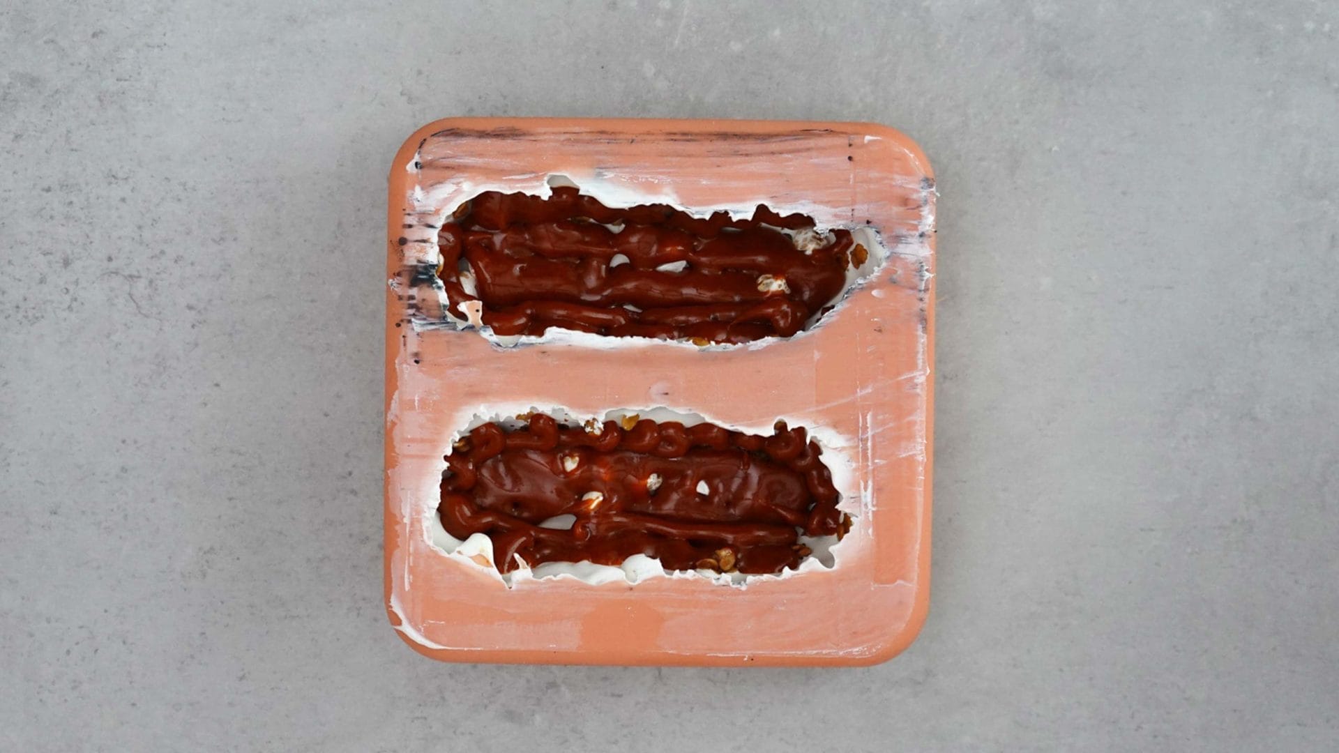 Filled chocolate bar mold with two bars