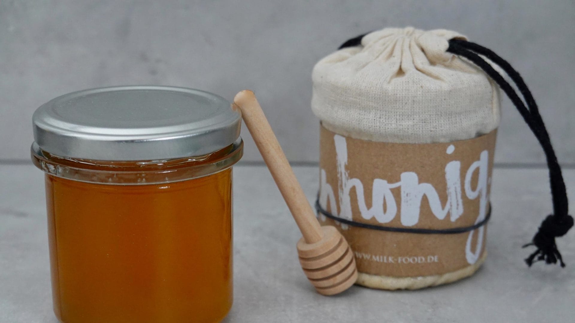 2 Honey in jar with honey spoon