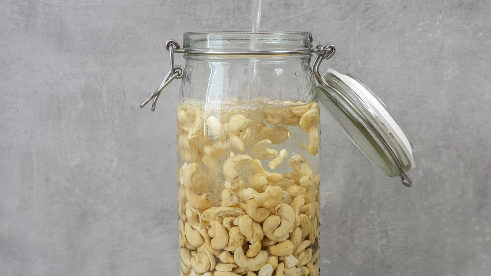 Cashcow - Cashews in water in ironing jar
