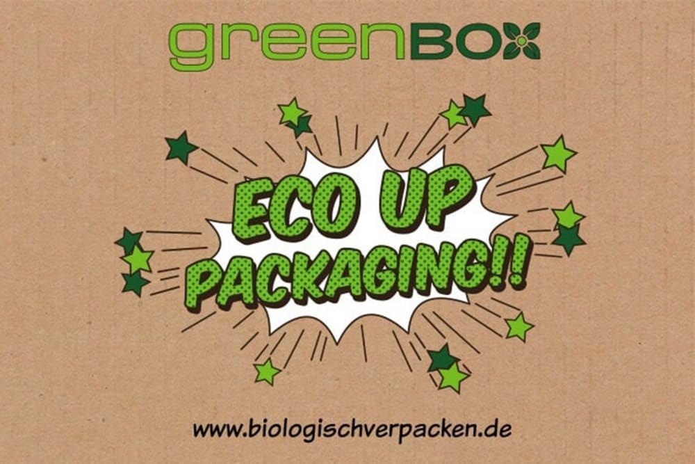 Das Logo von greenbox mit dem Claim "Eco Up Packaging!"